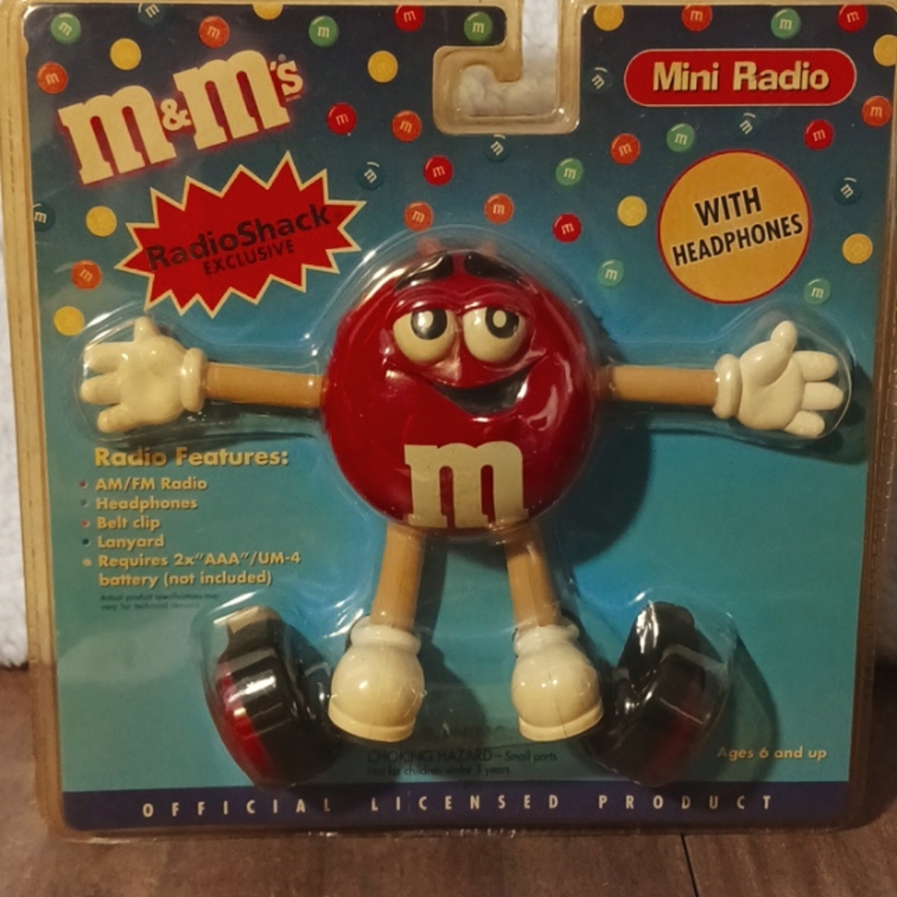 Vintage Radio Shack M&M mini radio with headphones.